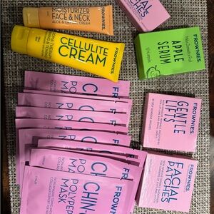 Frownies Skincare Set with Pink and Yellow Packaging